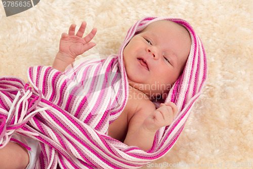 Image of smiling newborn baby