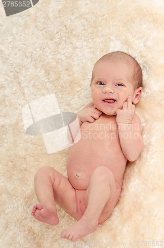 Image of smiling newborn baby