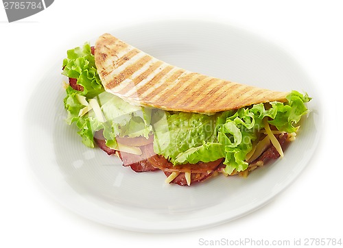 Image of Tortilla with lettuce and smoked meat