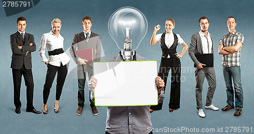 Image of Business Team With Lamp Head