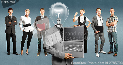 Image of Business Team With Lamp Head