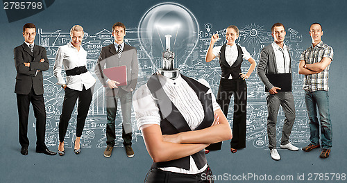 Image of Business Team With Lamp Head