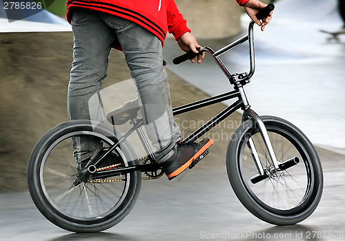 Image of bicycle and a boy