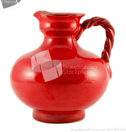 Image of red ceramic old jug with handle isolated on white  