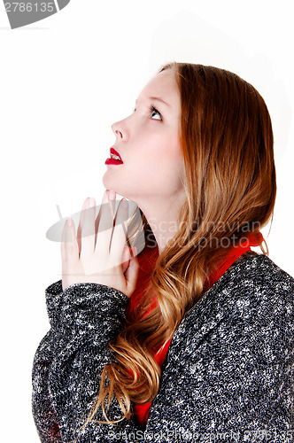 Image of Praying young woman.
