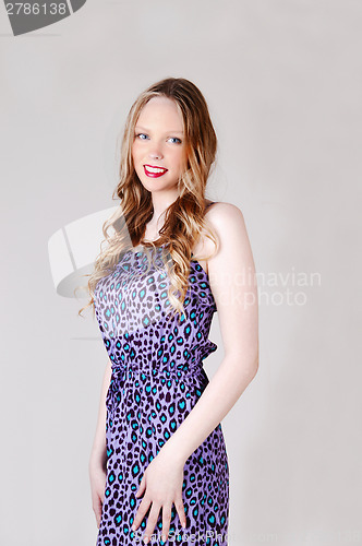 Image of Blond girl in dress.