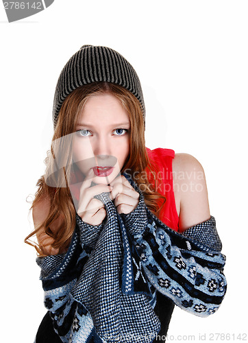 Image of Girl in sweater and hat.