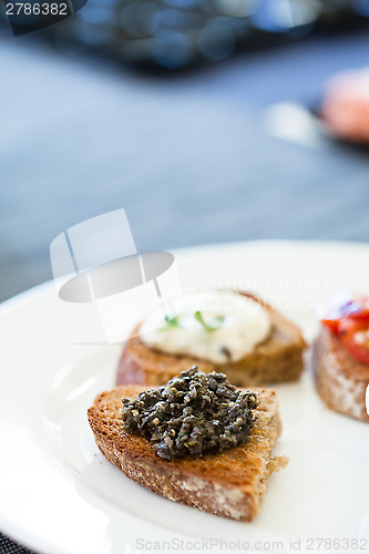 Image of Bruschetta appetizers on plate