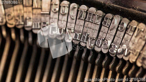 Image of Close-up of an old retro typewriter with paper