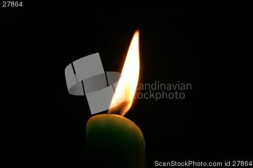 Image of candle in dark