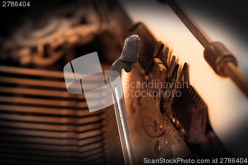 Image of Close-up of an old retro typewriter with paper