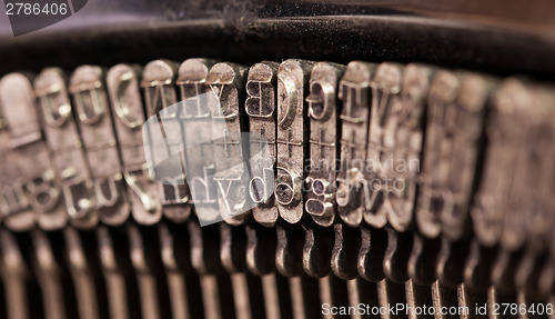 Image of Close-up of an old retro typewriter with paper