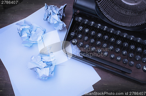 Image of Close-up of an old typewriter with paper