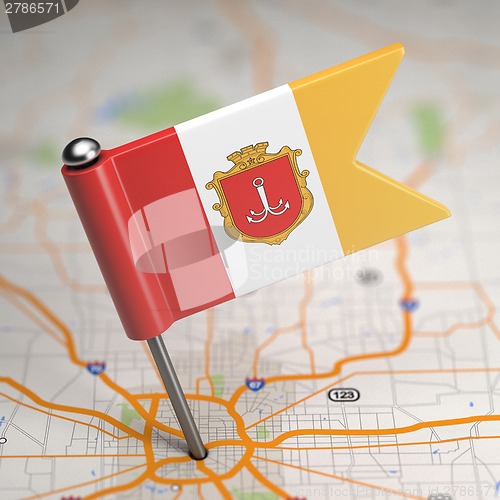 Image of Odessa Small Flag on a Map Background.