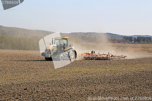 Image of Caterpillar Challenger Crawler Tractor Cultivating Field