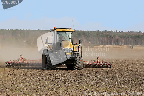 Image of Caterpillar Challenger Crawler Tractor and Potila Seedbed Cultiv