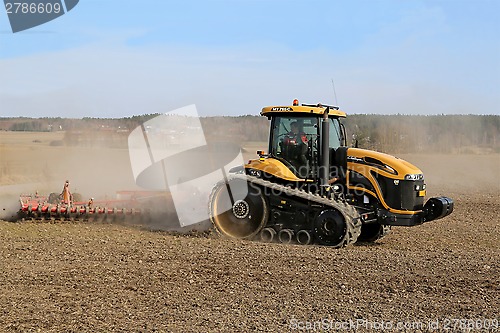 Image of Caterpillar Challenger Crawler Tractor and Potila Seedbed Cultiv