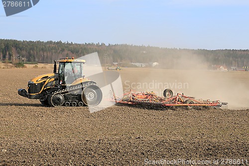 Image of Caterpillar Challenger Crawler Tractor and Potila Seedbed Cultiv