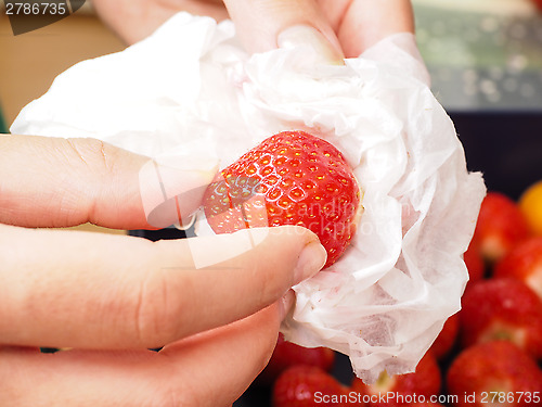 Image of Washing strawberry