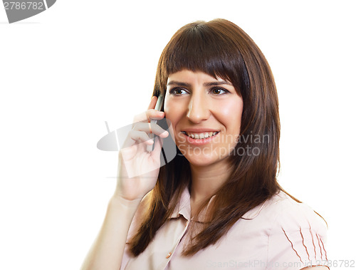 Image of Attractive young woman with a phone on an isolated white