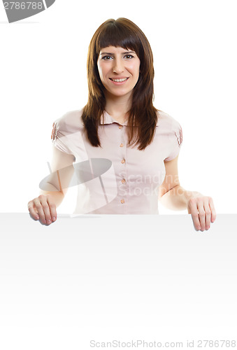 Image of Attractive young woman with a poster on an isolated white