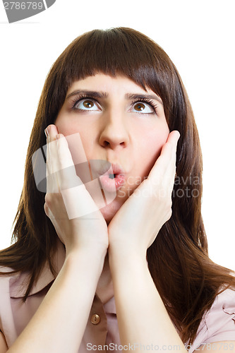 Image of Surprised young woman on an isolated white