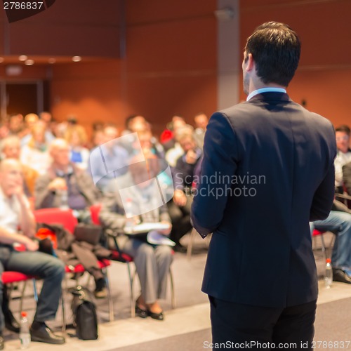 Image of Speaker at Business Conference and Presentation.