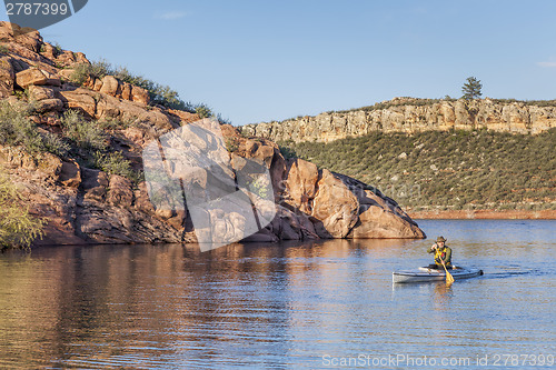 Image of canoe paddling on a lake