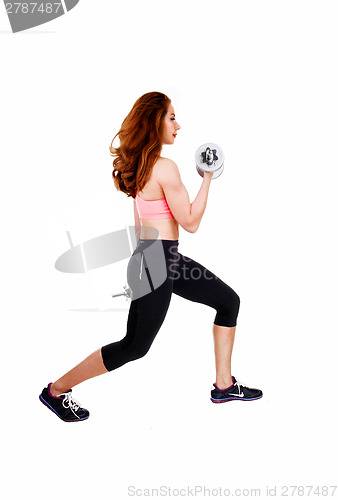 Image of Exercising with dumbbell's.
