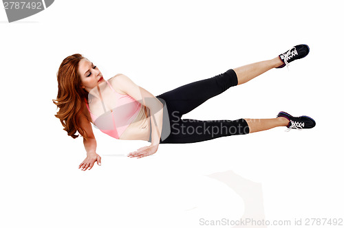Image of Woman doing leg workout.
