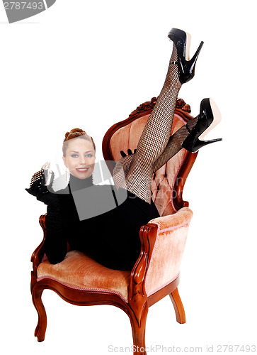 Image of Woman with legs up.