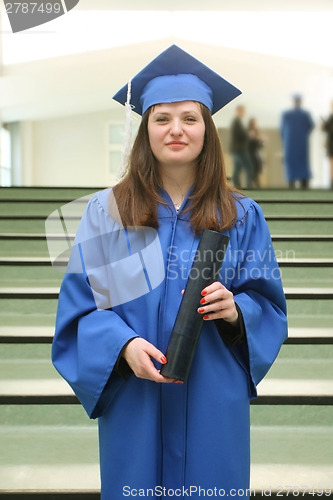 Image of Smiling graduation woman