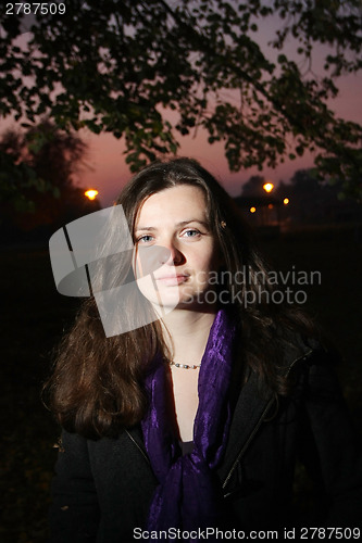 Image of Brunette in park 