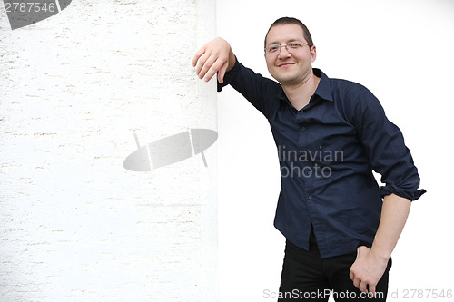 Image of Man posing on the wall