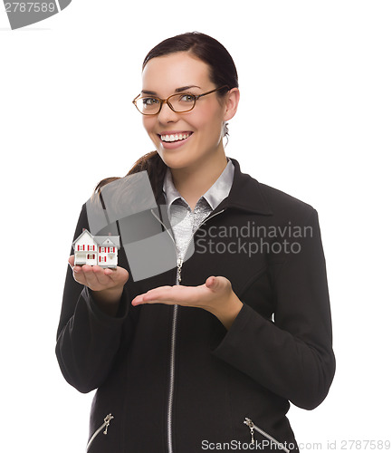 Image of Mixed Race Businesswoman Holding Small House to the Side