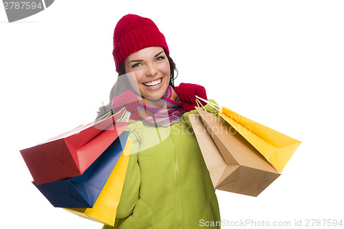 Image of Mixed Race Woman Wearing Hat and Gloves Holding Shopping Bags