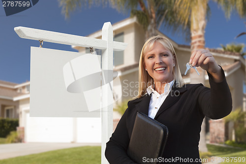 Image of Blank Sign and Real Estate Agent Handing Over the Keys