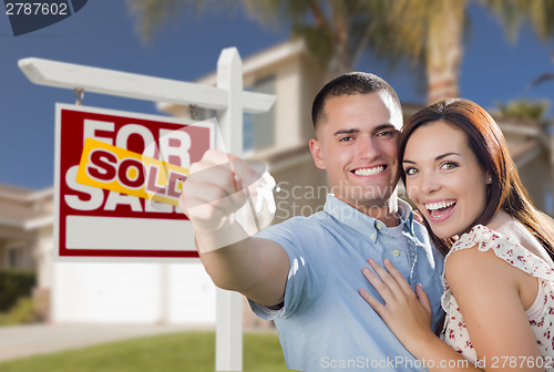 Image of Military Couple In Front of Home, House Keys and Sign