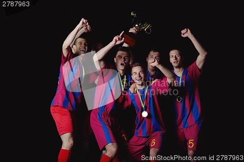 Image of soccer players celebrating victory