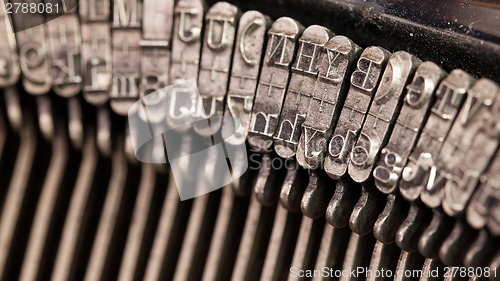 Image of Close-up of an old retro typewriter with paper