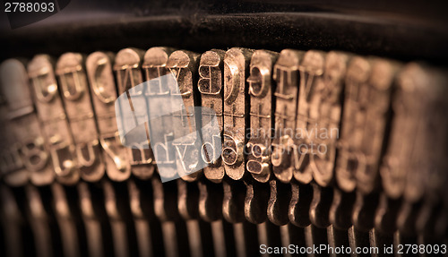 Image of Close-up of an old retro typewriter with paper