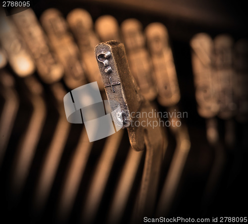Image of Close-up of an old retro typewriter with paper