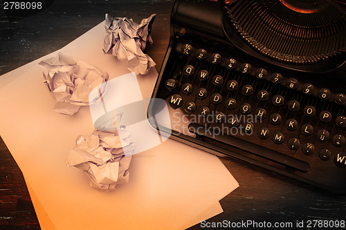 Image of Close-up of an old typewriter with paper