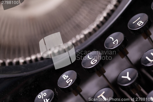 Image of Close up photo of antique typewriter keys