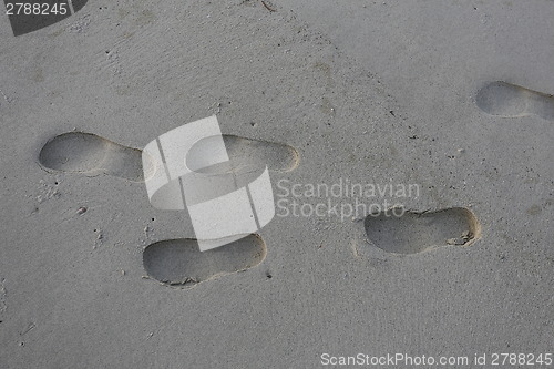 Image of footprints in the sand