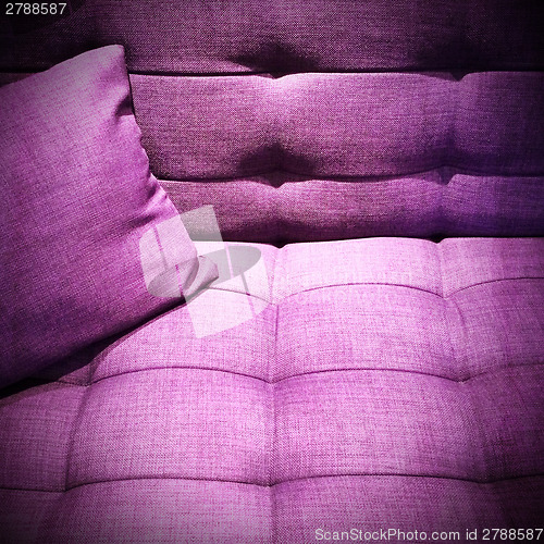 Image of Purple sofa under the light