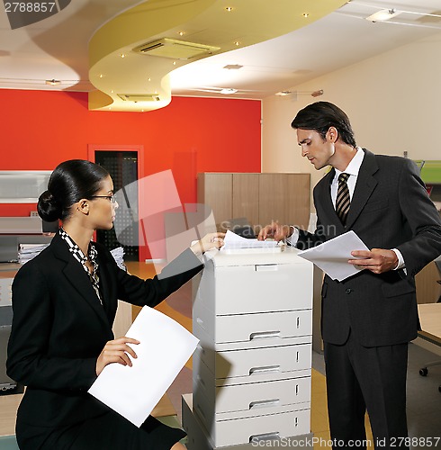 Image of businesswoman making copies l