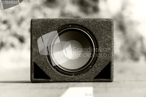 Image of Subwoofers on the road outdoors