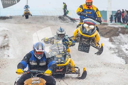 Image of Racing of snowmobiles