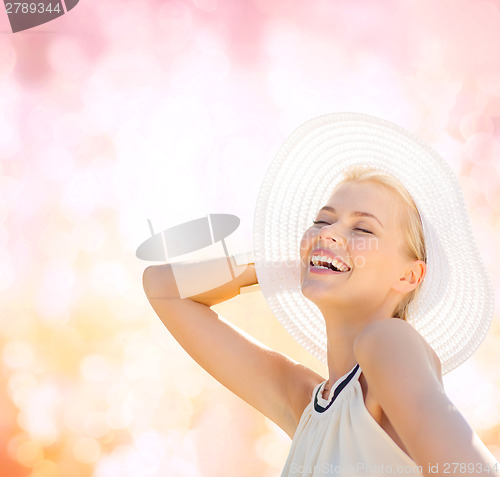 Image of beautiful woman enjoying summer outdoors